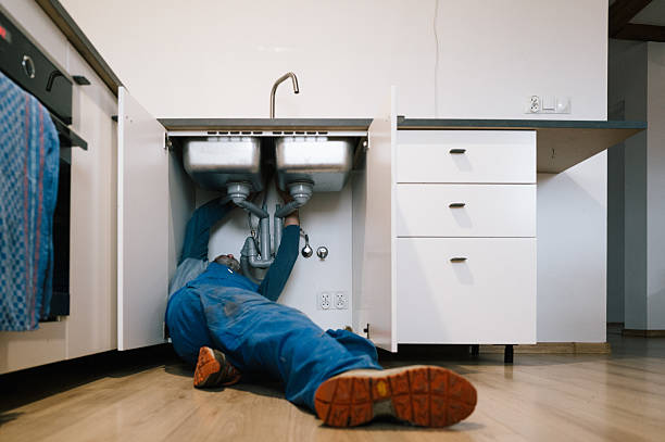 Professional Drain Cleaning technician working in Sterling, KS